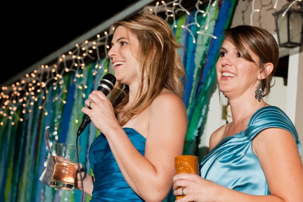 My beautiful sisters, and matrons of honor, making a toast in front of the streamer project